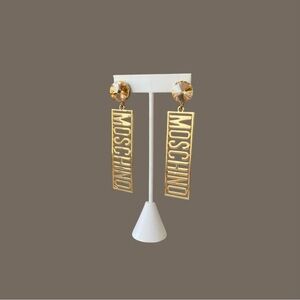 MOSCHINO Logo Post Gold Plated Earrings with Champagne Rivoli Rhinestones